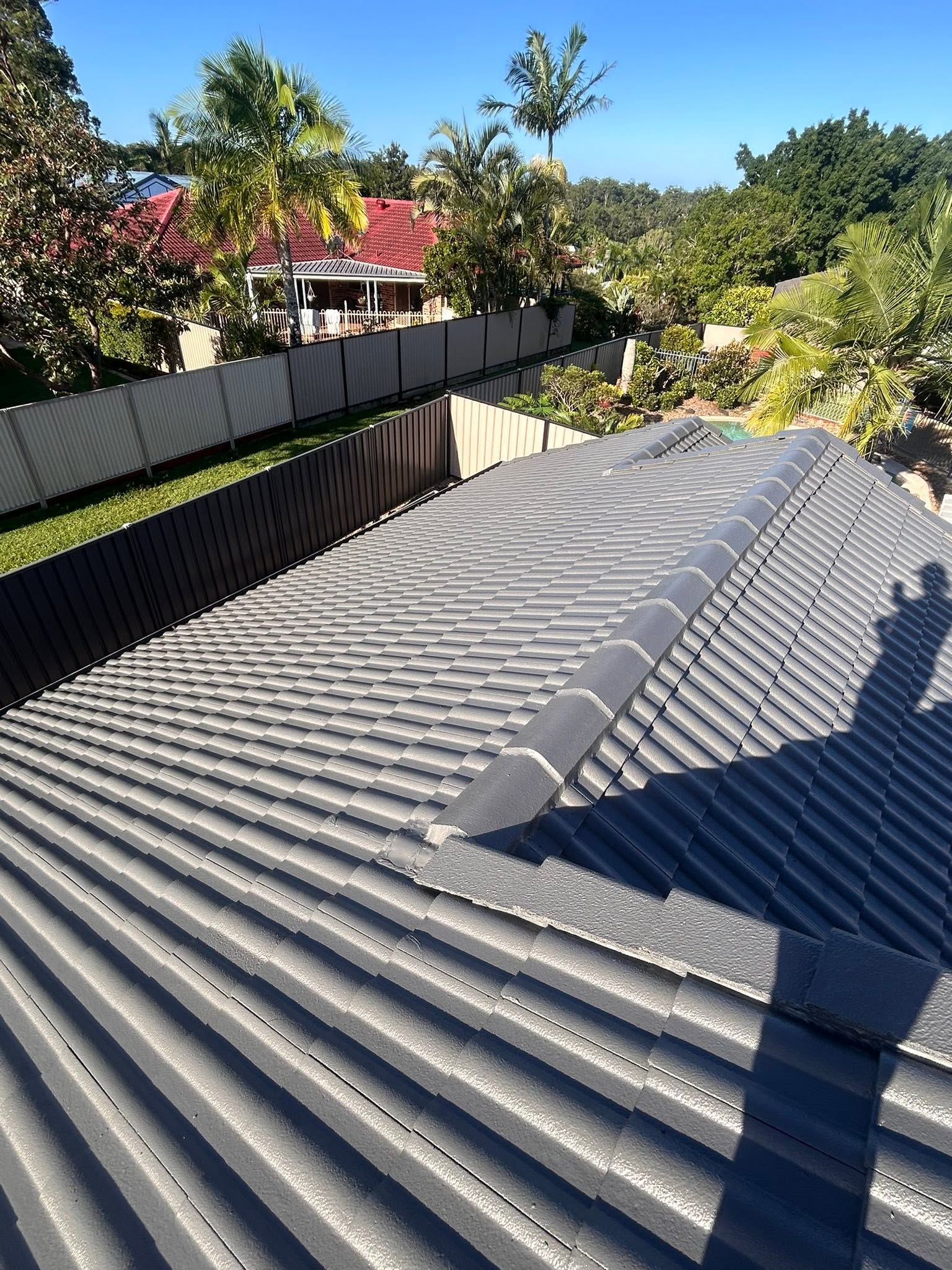 Restored roof after Sky Shield: Even charcoal finish, sealed ridges